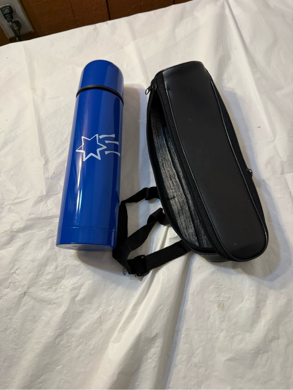 blue Excede steel travel thermos with carrying case